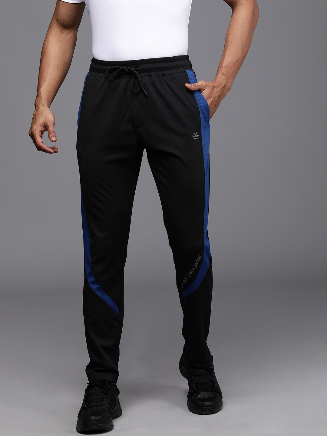 

WROGN ACTIVE Men Black Solid Regular Track Pants With Side Stripes