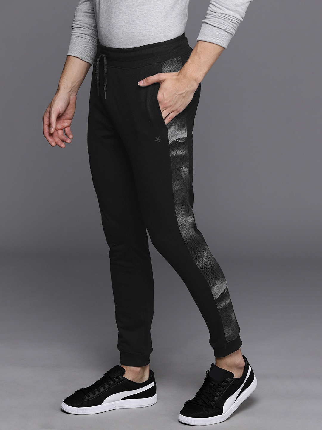 

Wrogn Men Black Solid Mid-Rise Regular Fit Joggers Track Pants With Side Print