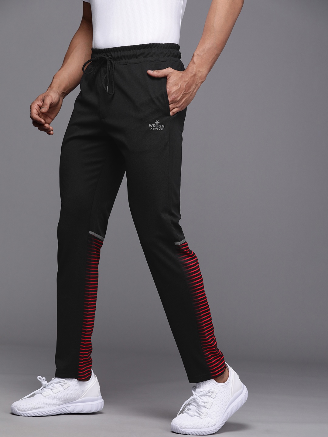 

WROGN ACTIVE Men Black Solid Slim Fit Track Pants with Dry Pro Technology & Striped Detail