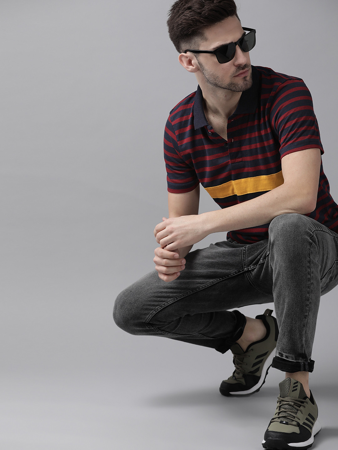 

Roadster Men Maroon & Navy Blue Striped Cotton Polo Collar T-shirt