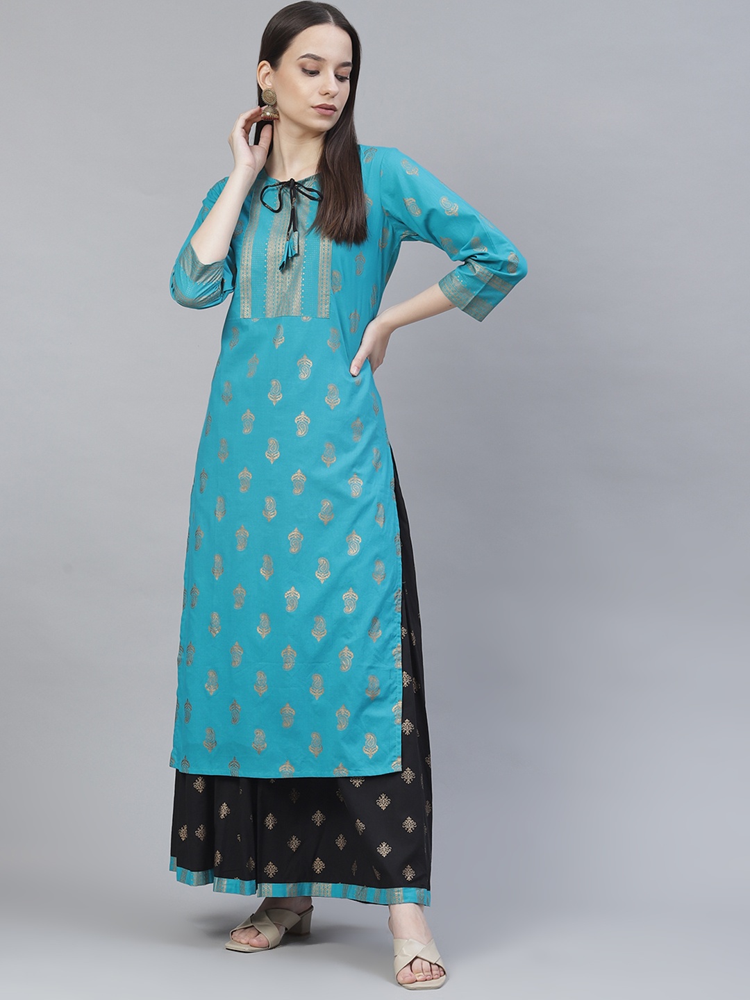 

Meeranshi Women Turquoise Blue Paisley Printed Regular Kurta with Skirt