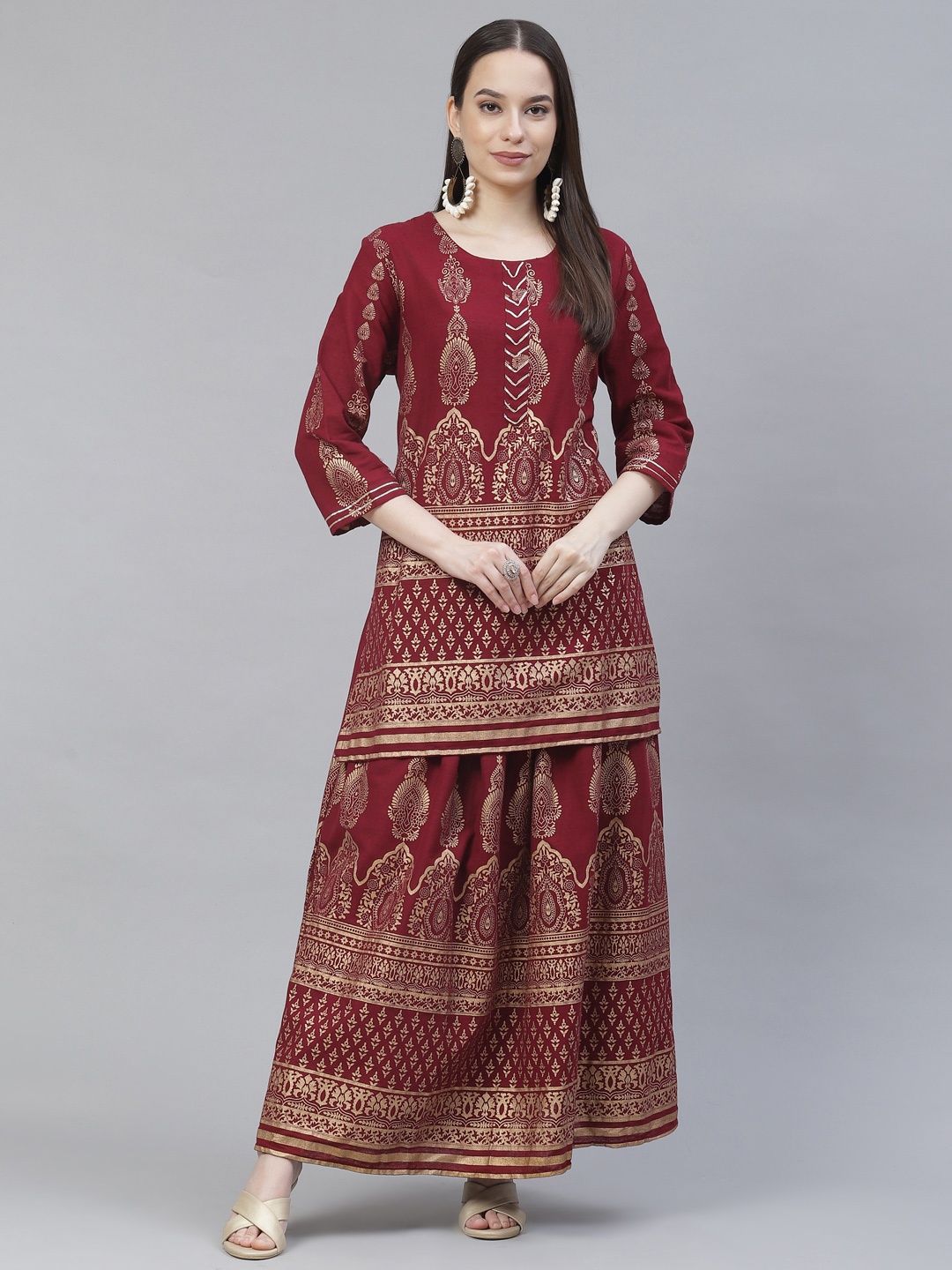 

Meeranshi Women Maroon Ethnic Motifs Printed Regular Kurti with Skirt