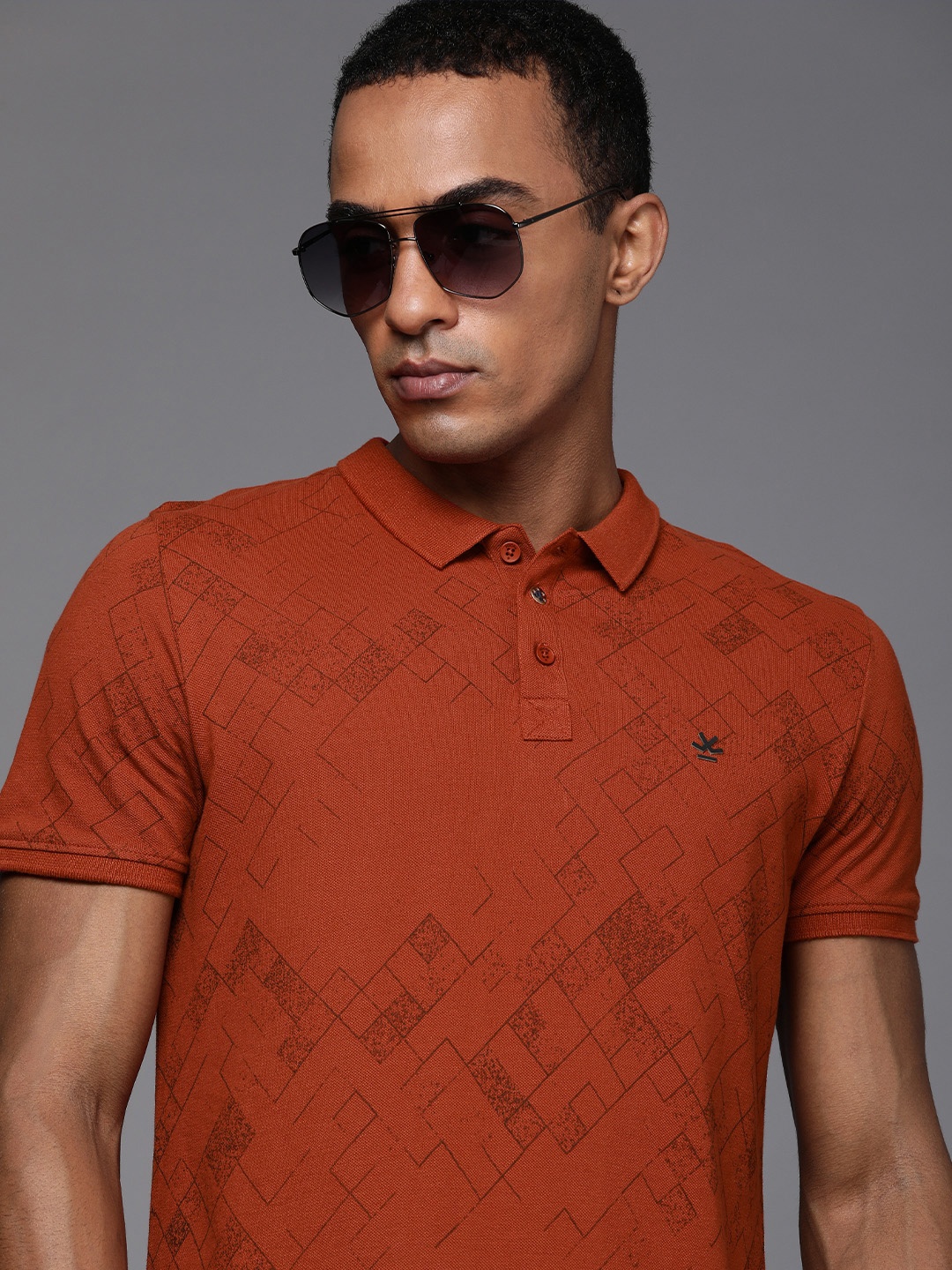 

WROGN Men Red Geometric Printed Polo Collar Pure Cotton Slim Fit Casual T-shirt