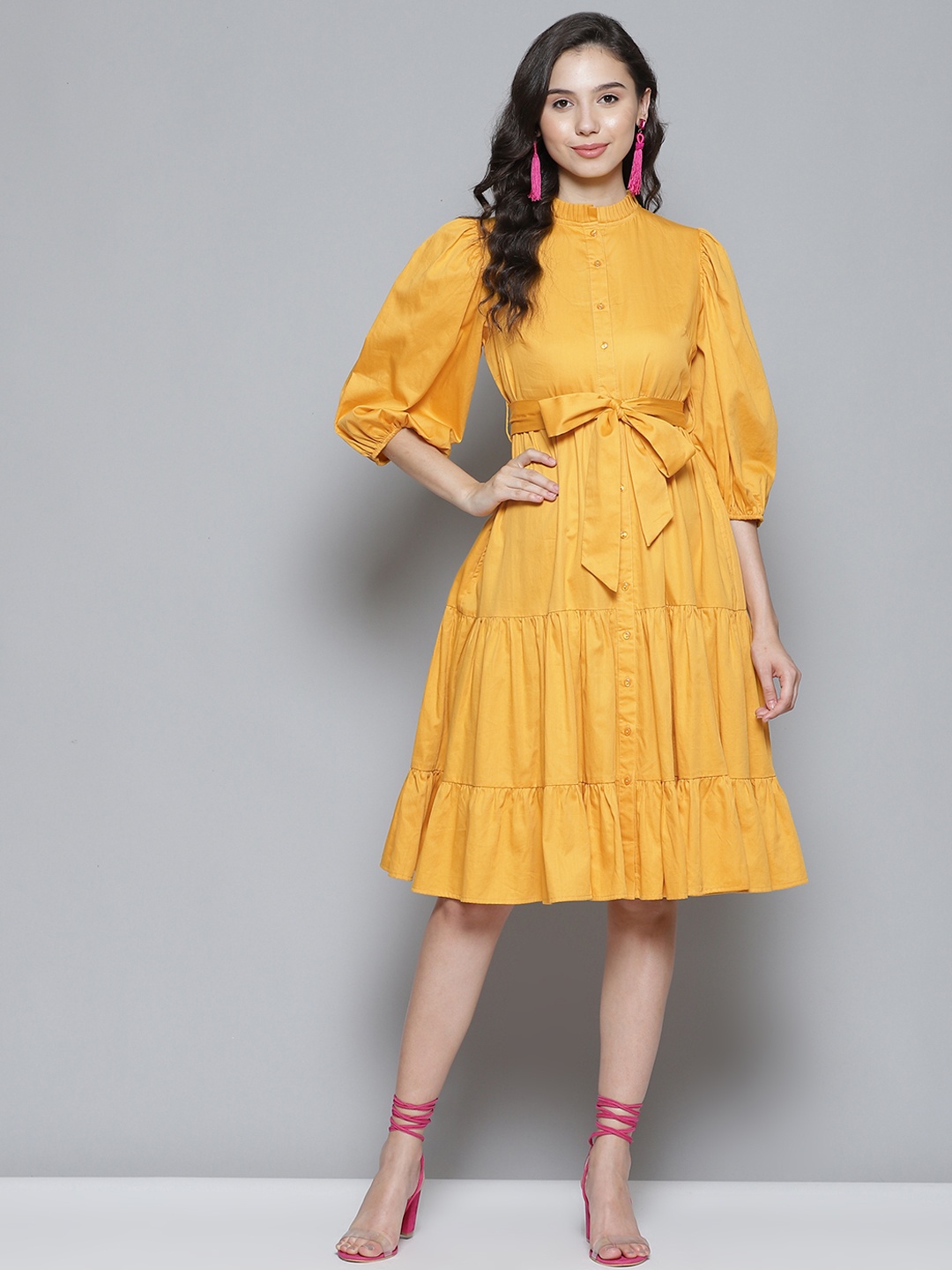 

Femella Mustard Yellow Solid Puff Sleeves Tiered Dress with Belt