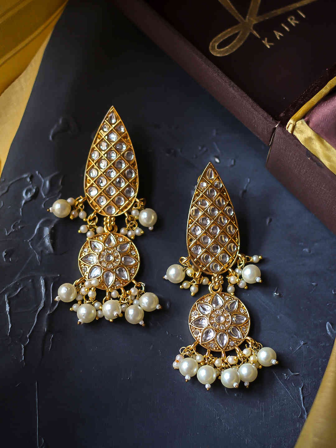 

Kairi Gold-Toned & Off White Contemporary Drop Earrings