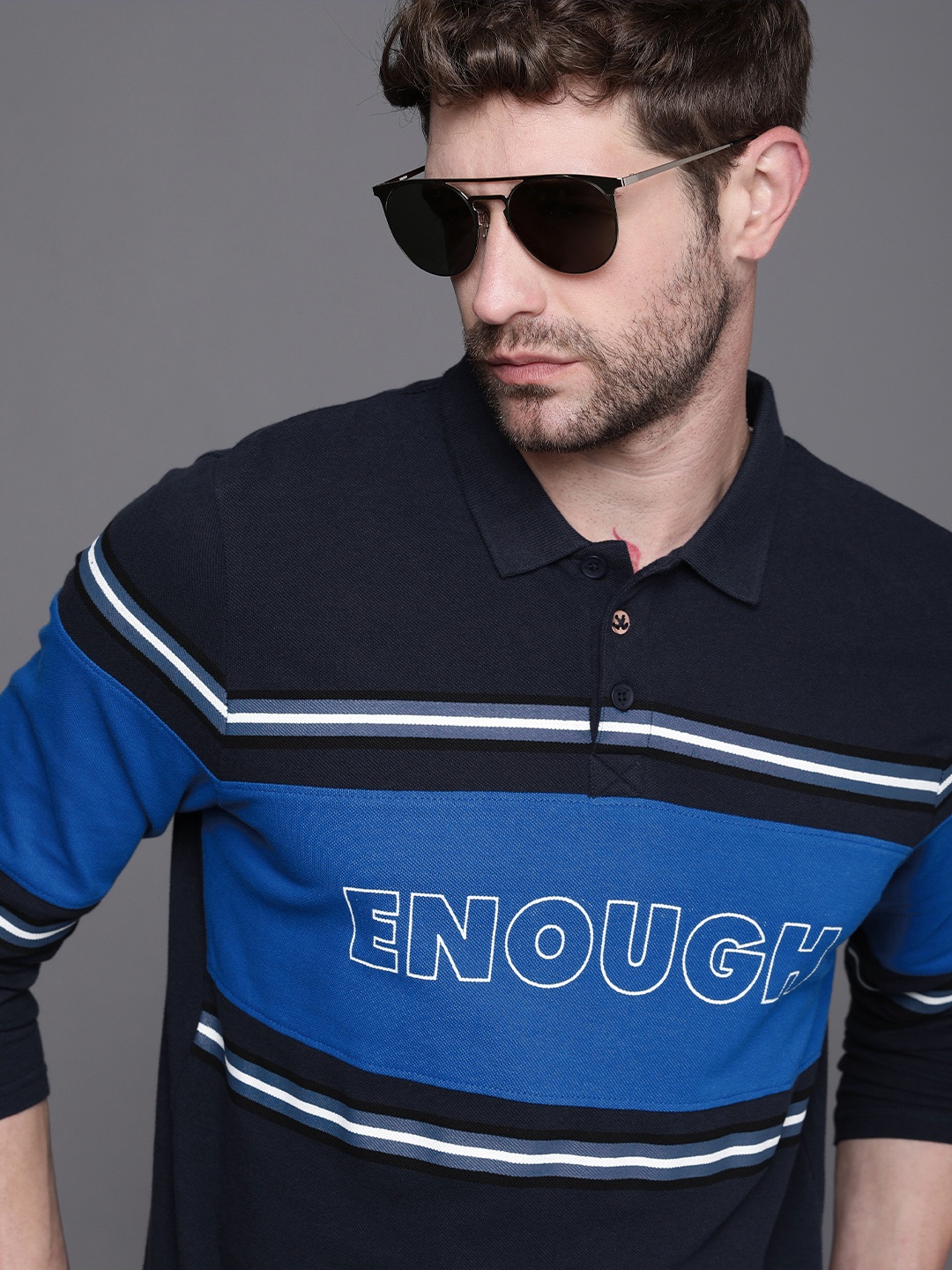 

WROGN Men Navy Blue Colourblocked And Typography Printed Polo Collar Slim Fit T-shirt