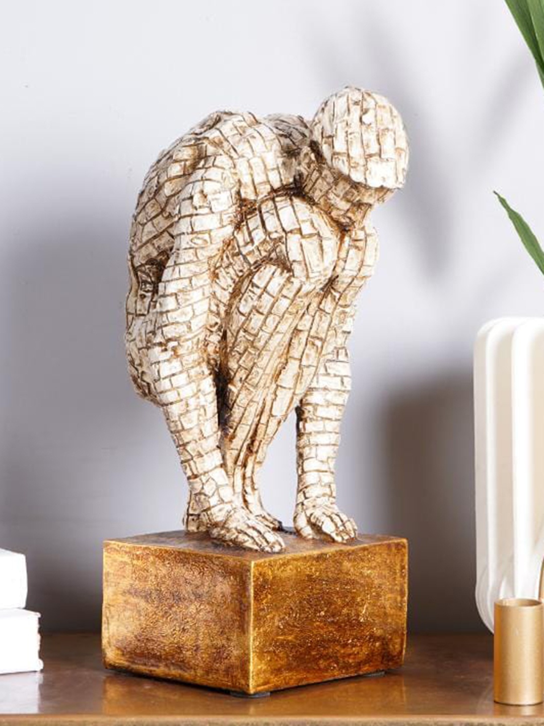 

THE ARTMENT Brown Surreal Bricked Man Table Accent