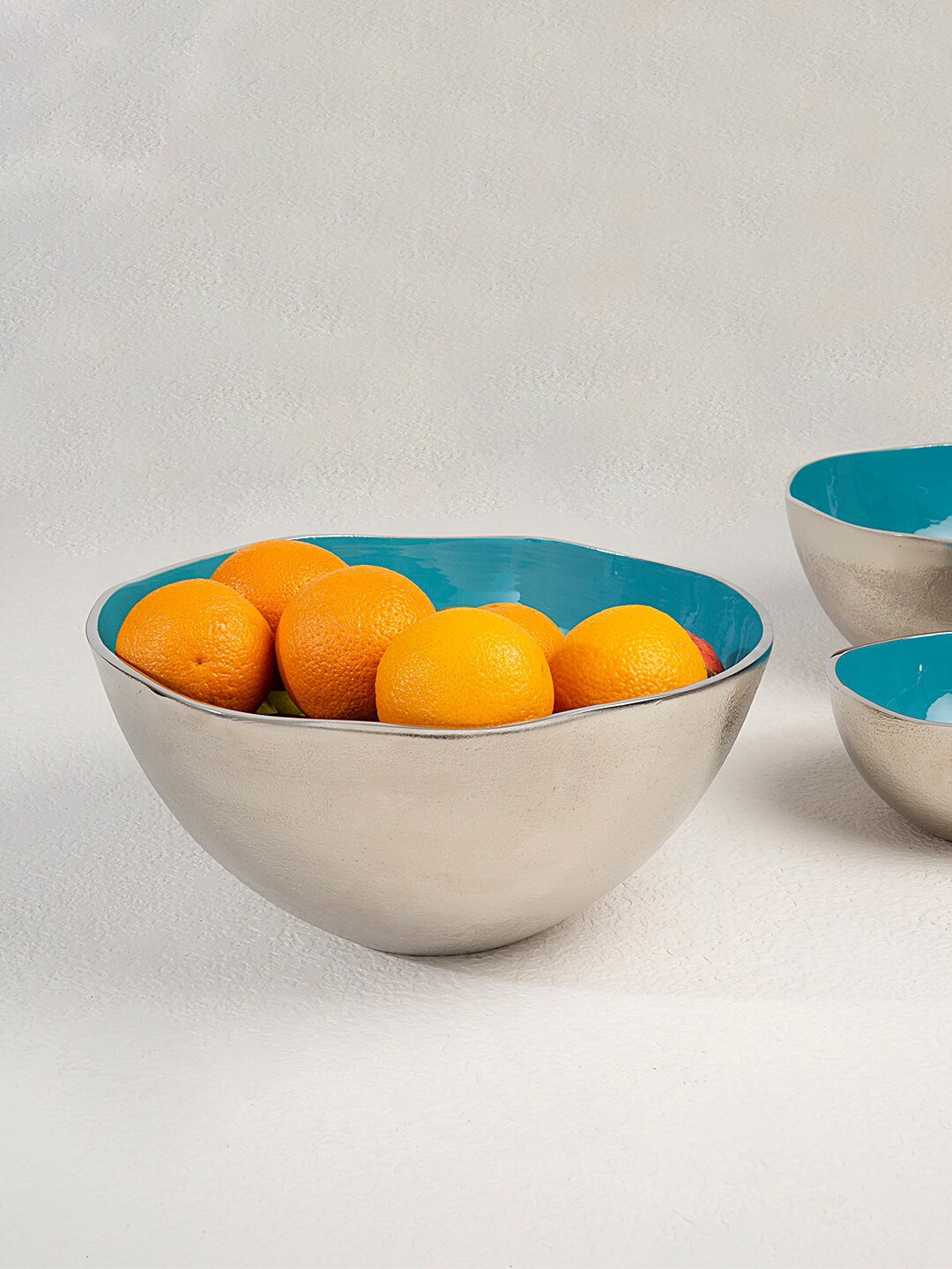 

ellementry Silver-Toned & Blue Solid Fruit Bowl