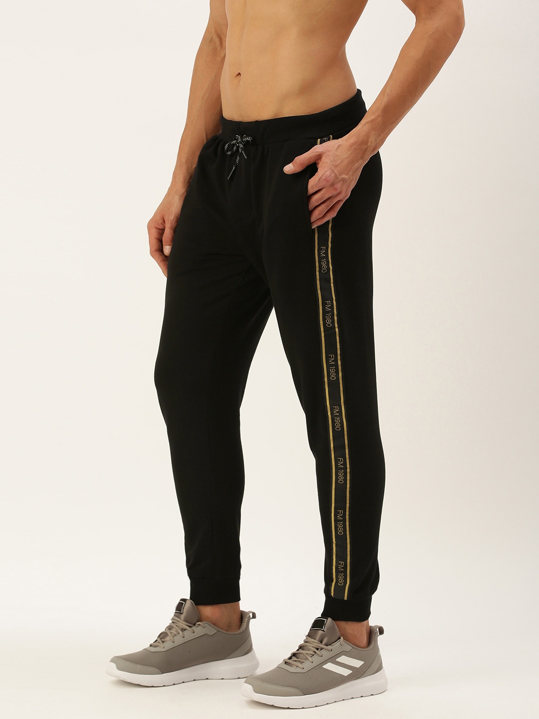 

Flying Machine Men Black Solid Joggers with Side Taping Detail