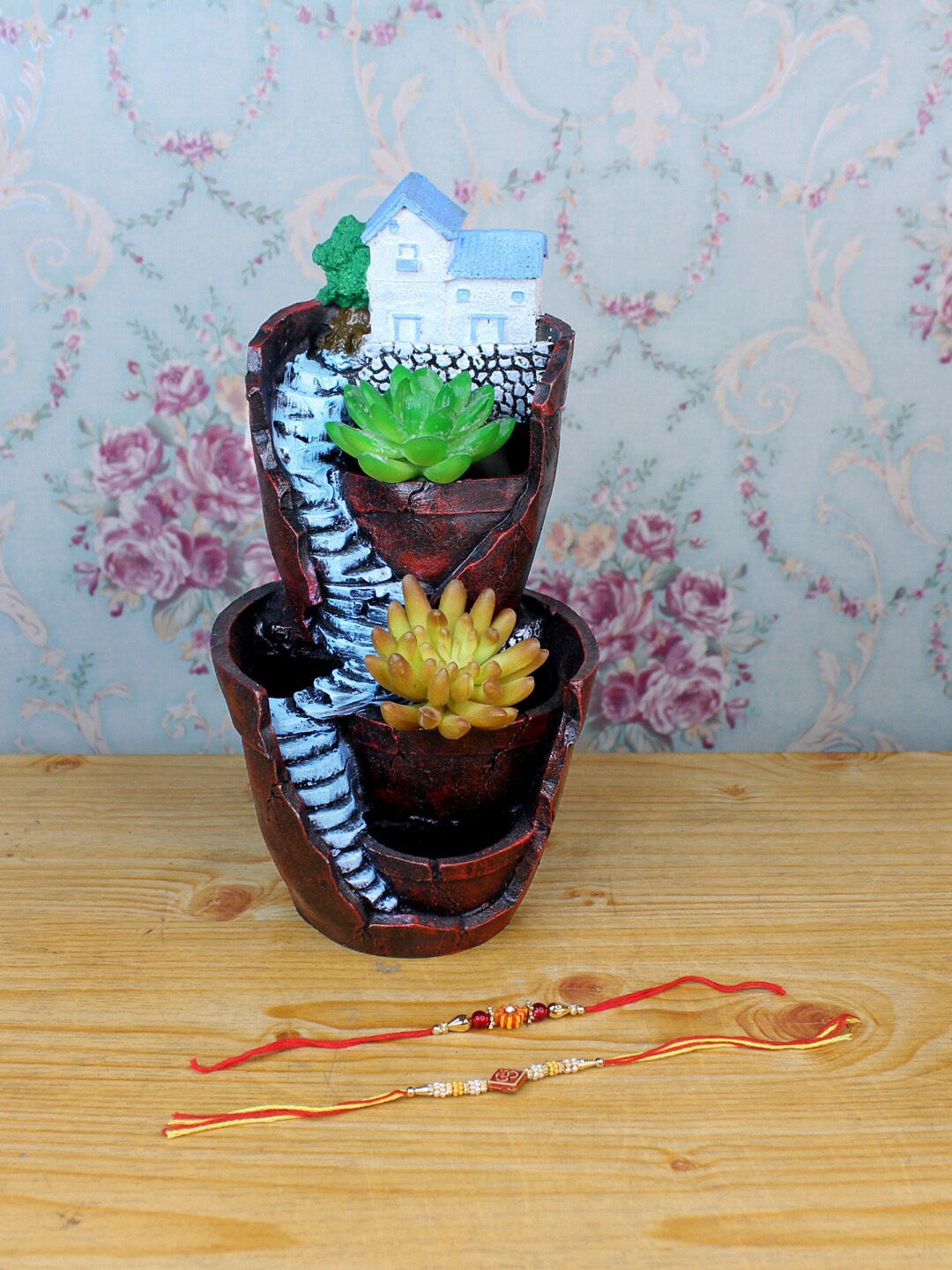 

Wonderland Brown & Red Set Of 2 Rakhi With Hill House Succulent Planter