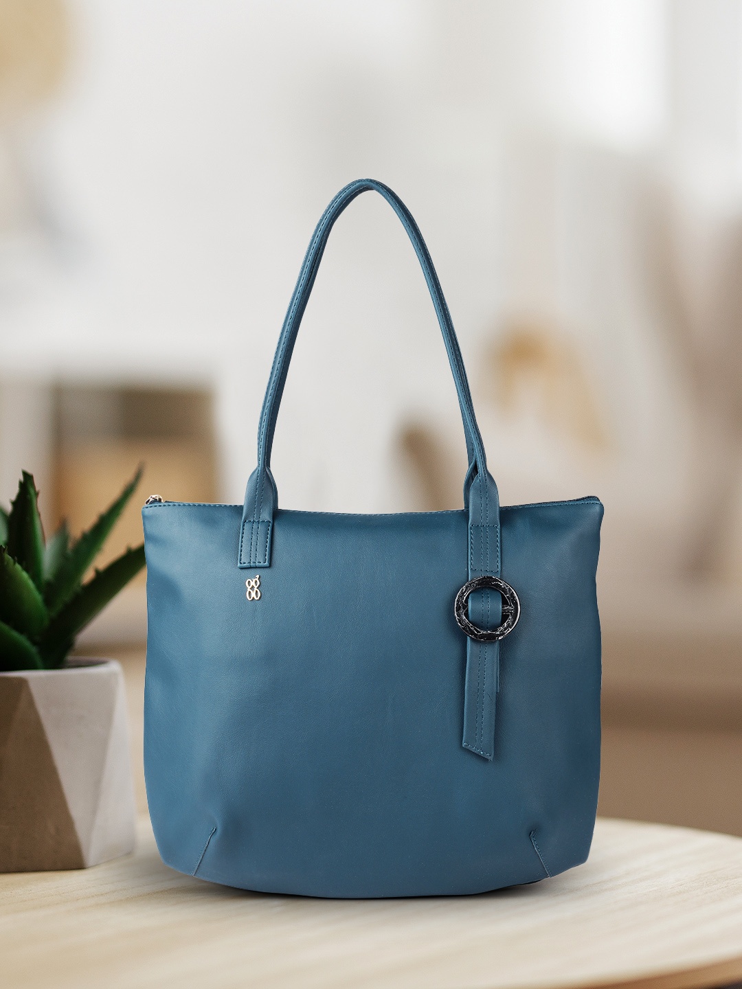 

Baggit Teal Blue Solid Structured Shoulder Bag