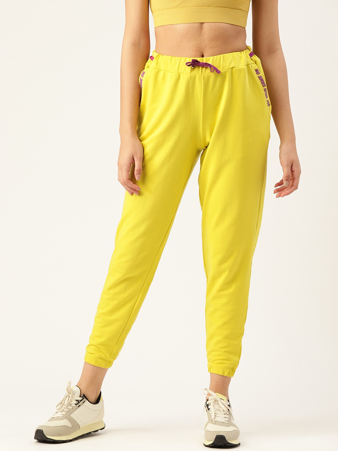 

DressBerry Women Yellow Solid Mid-Rise Cropped Joggers