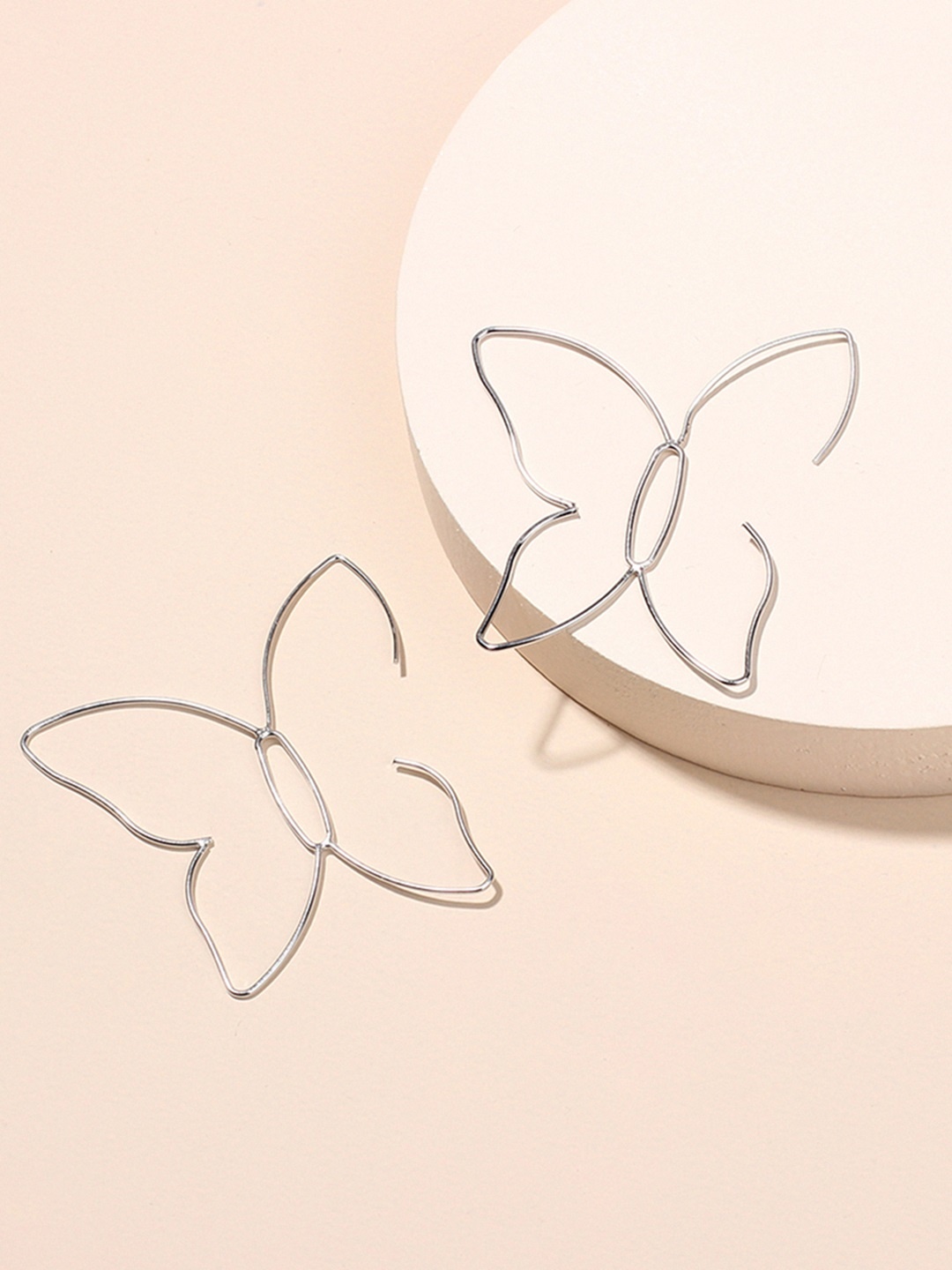 

URBANIC Silver-Toned Butterfly Shaped Drop Earrings