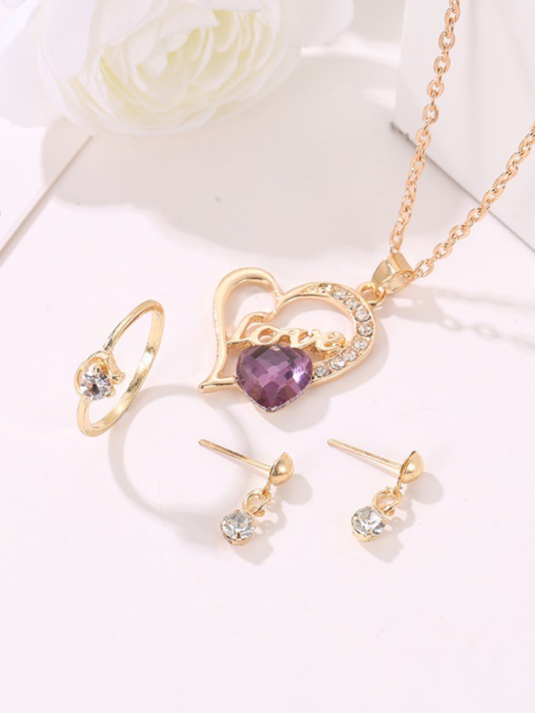 

URBANIC Gold-Toned & Purple Stone-Studded Jewellery Set