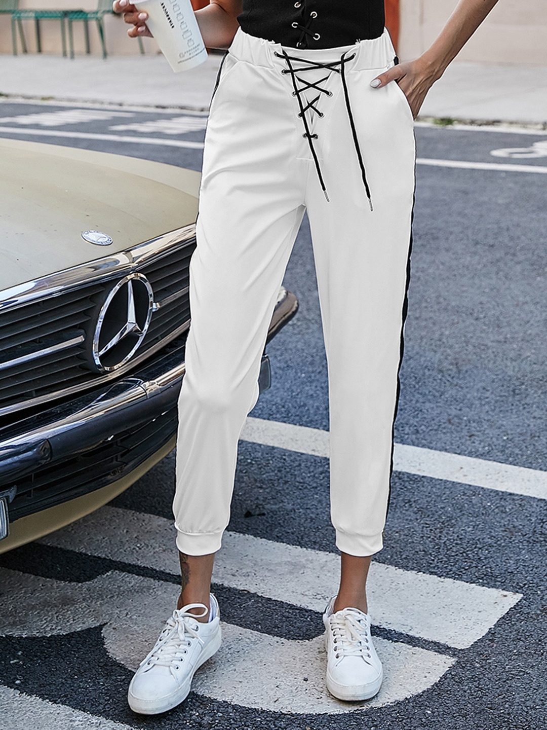 

URBANIC Women White & Black Solid Side Striped Crop Joggers