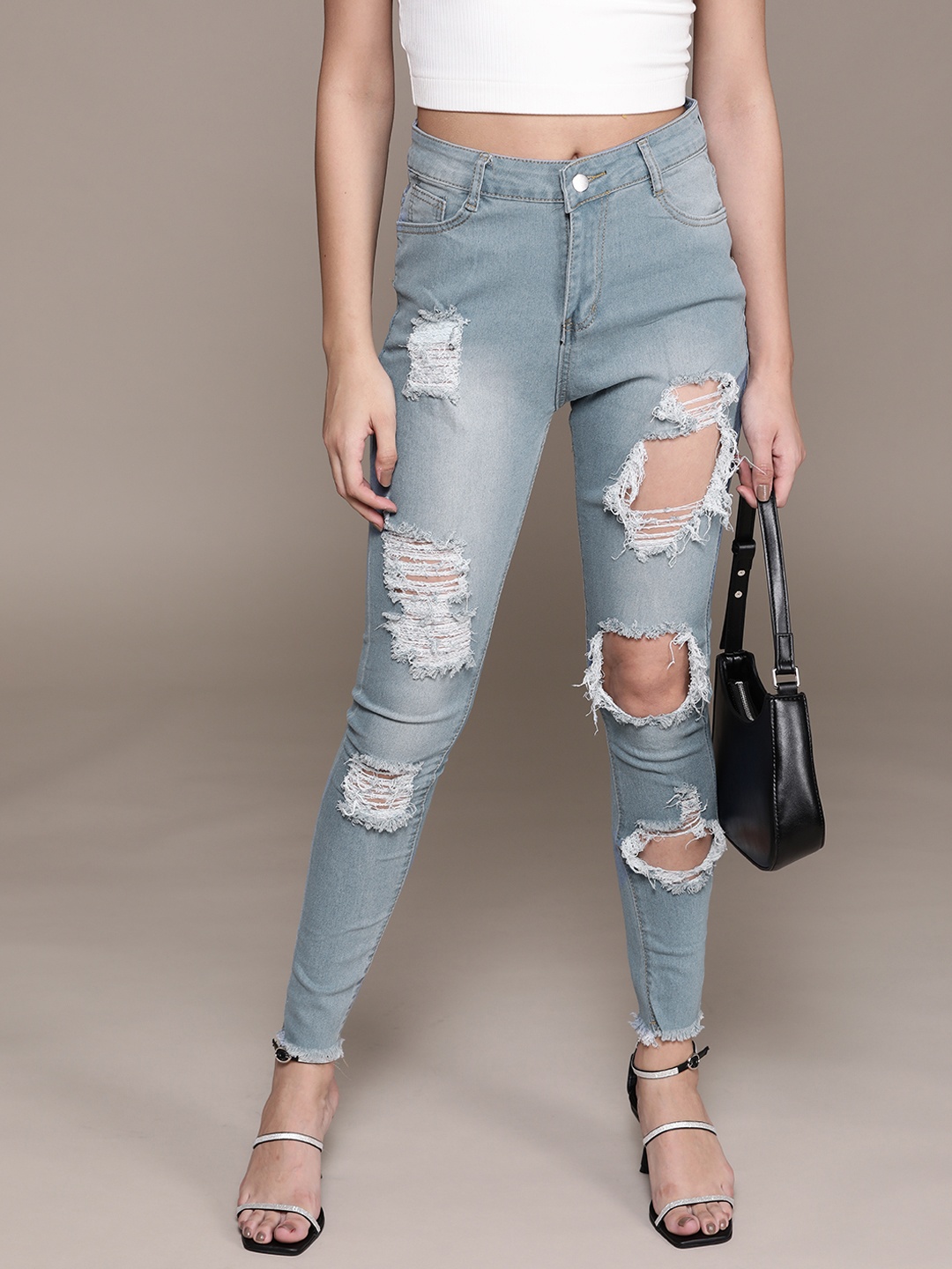 

URBANIC Women Blue Slim Fit Highly Distressed Light Fade Stretchable Jeans