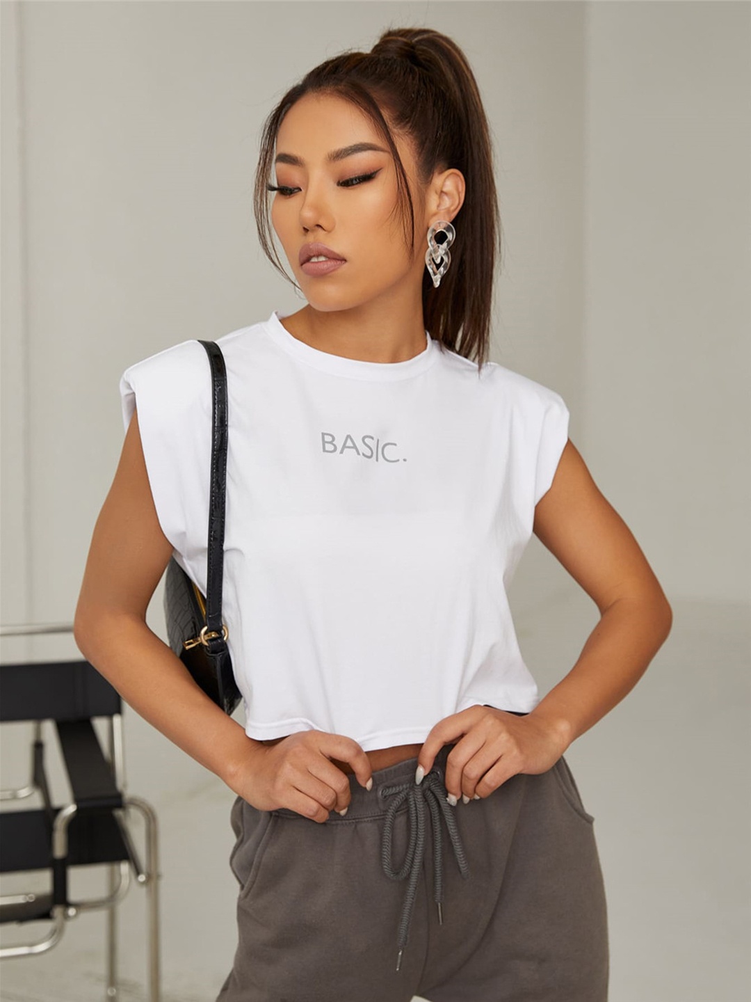 

URBANIC Women White Typography Extended Sleeves Boxy T-shirt