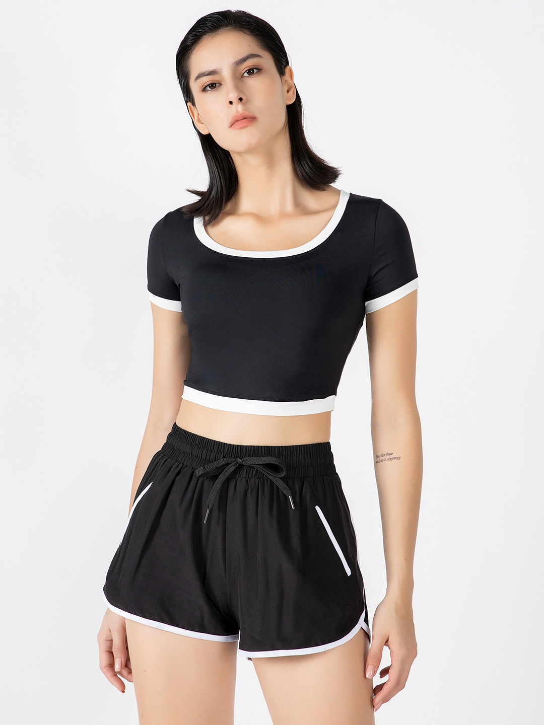 

URBANIC Women Black & White T-shirt