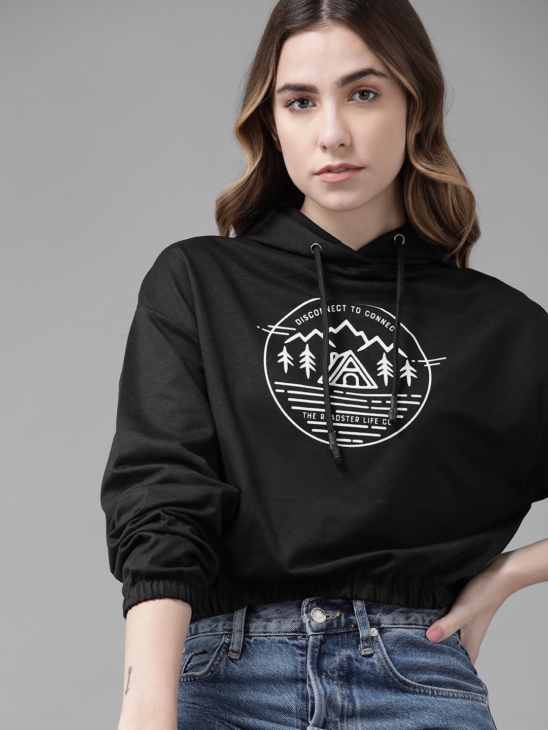 

Roadster Women Black Printed Hooded Sweatshirt