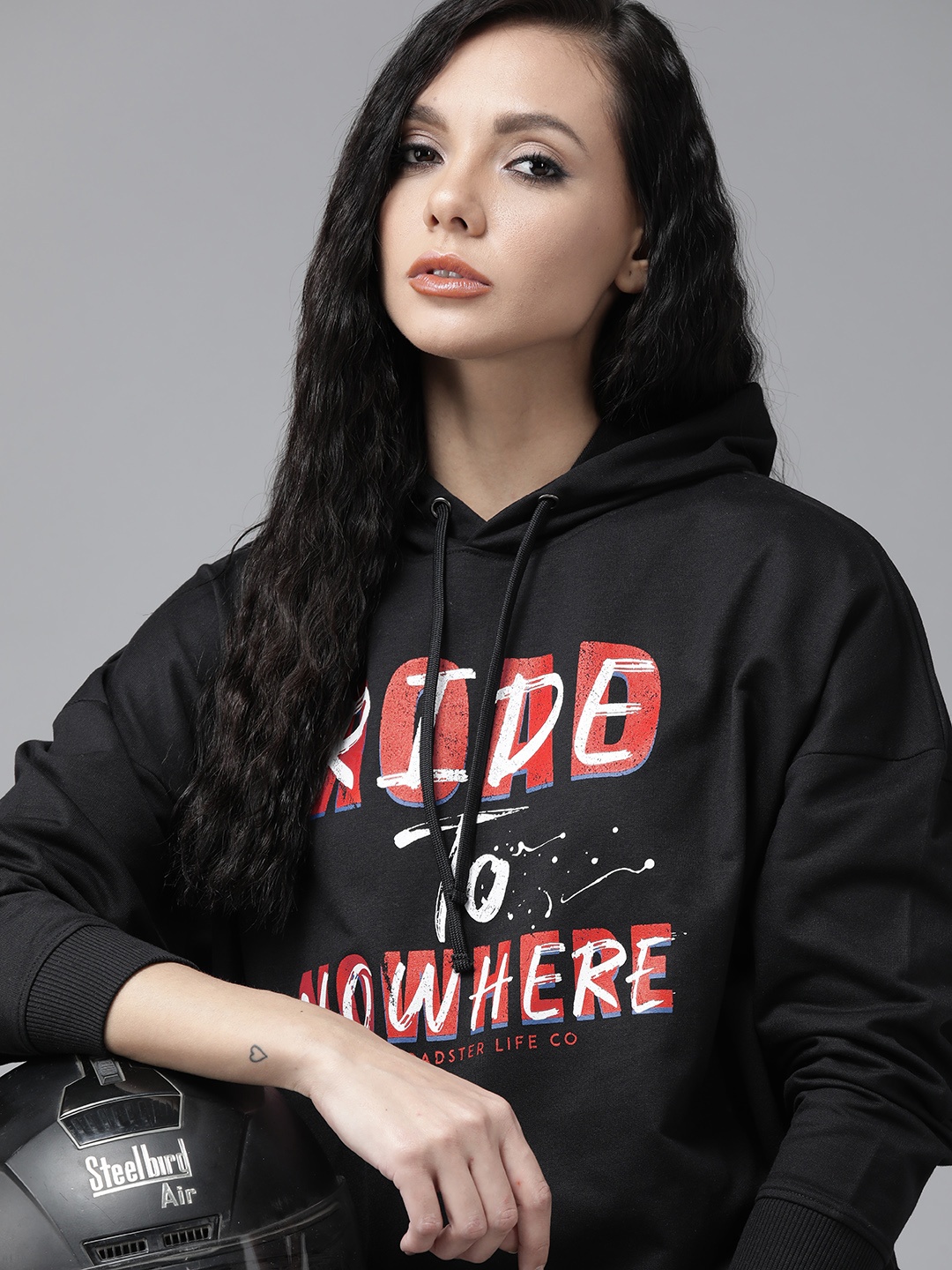 

Roadster Women Black Printed Hooded Sweatshirt