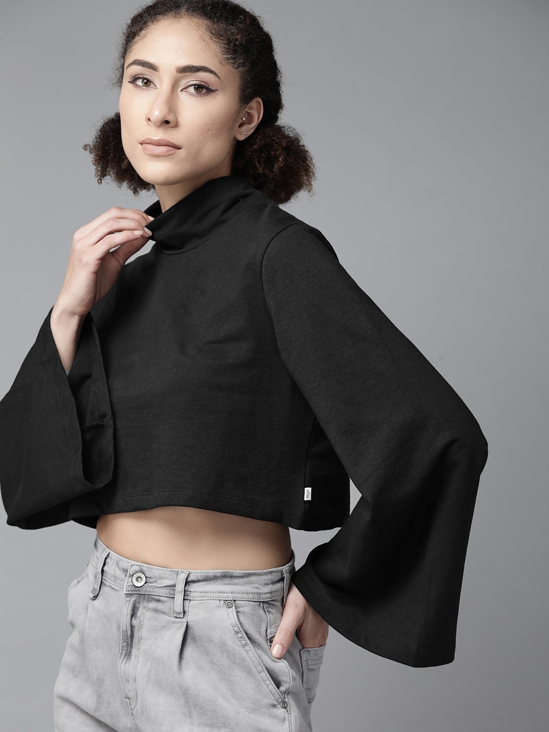 

Roadster Women Black Solid Sweatshirt