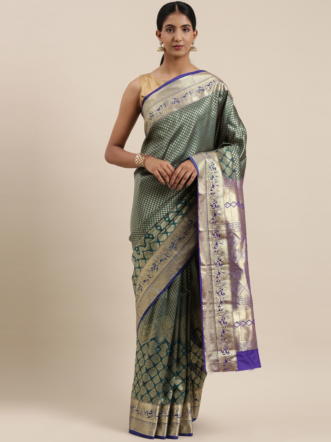 

The Chennai Silks Green & Silver-Toned Ethnic Motifs Art Silk Saree