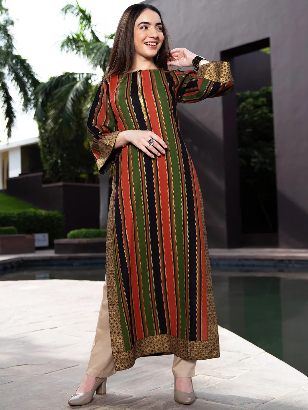 

Rustorange Women Black & Green Striped Keyhole Neck Flared Sleeves A-Line Kurta