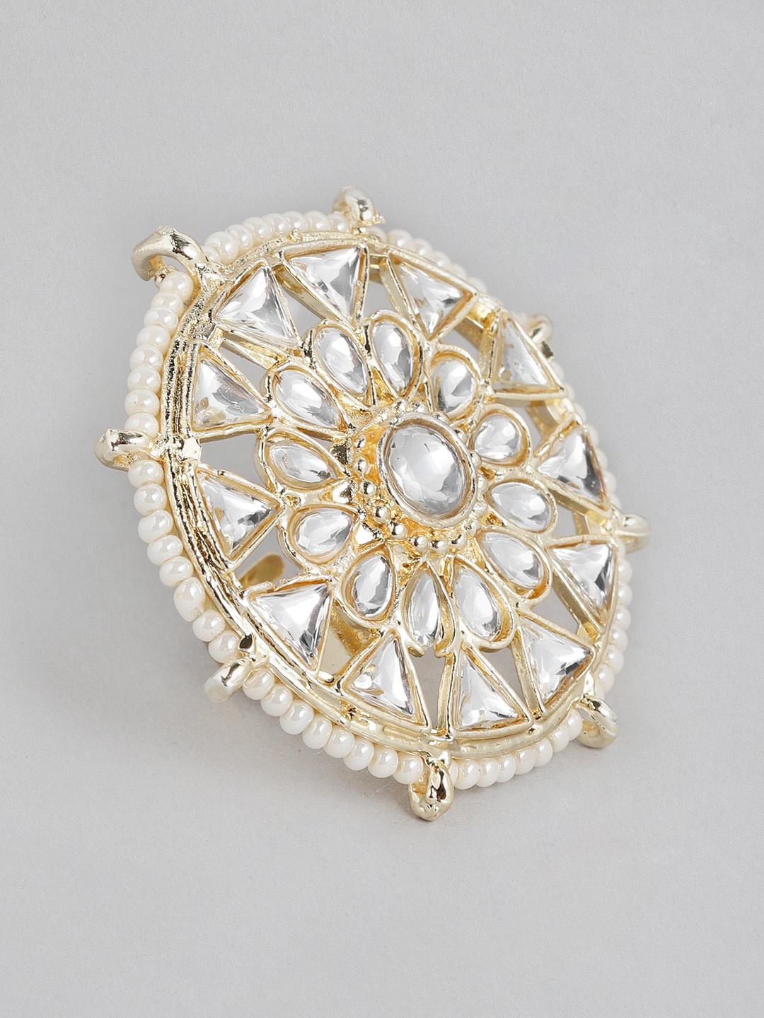 

Kord Store Gold-Plated & White Stone Studded Round Shape Adjustable Finger Ring