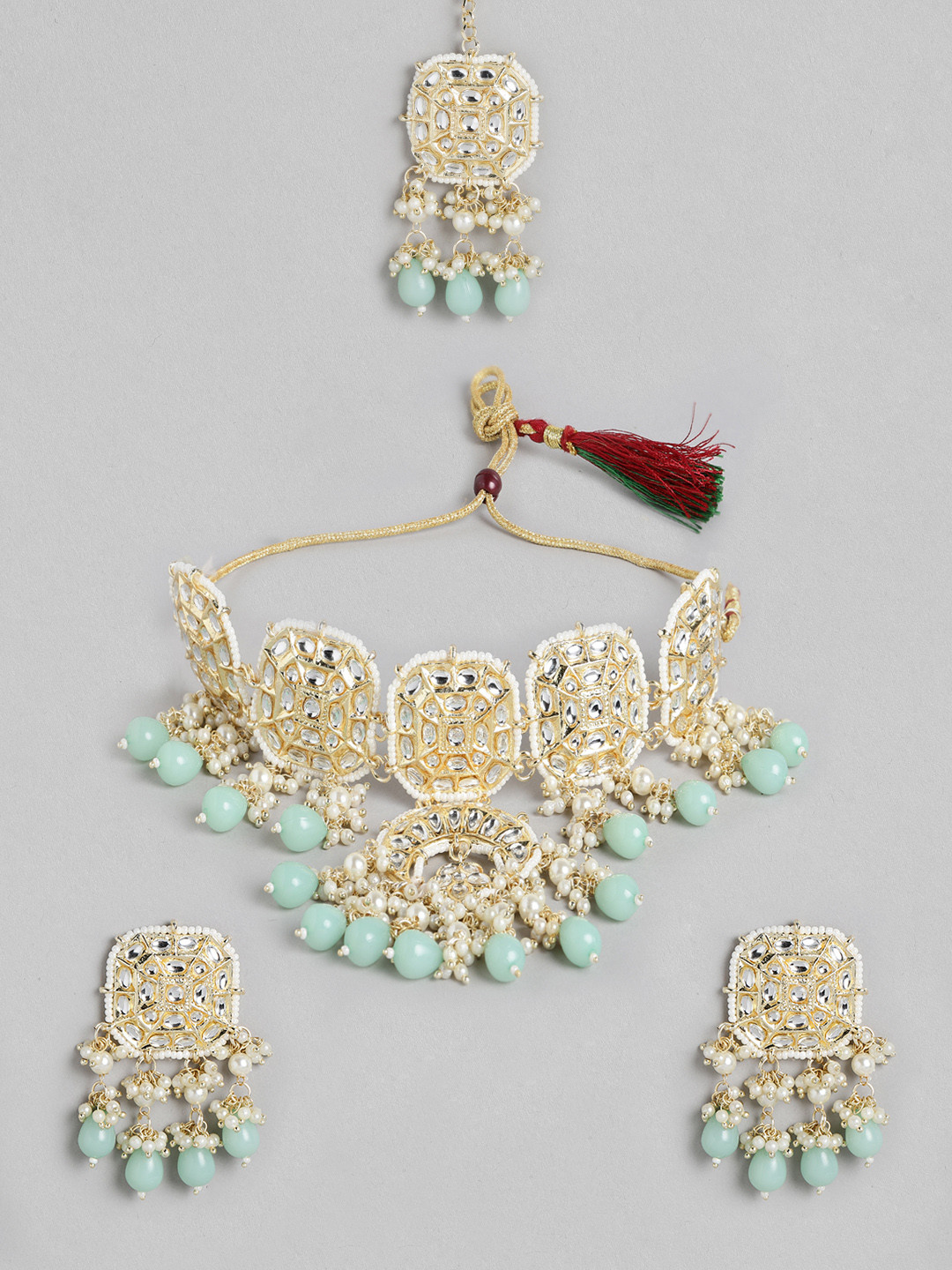 

Kord Store Off-White & Green Gold-Plated Stone Studded & Beaded Jewellery Set