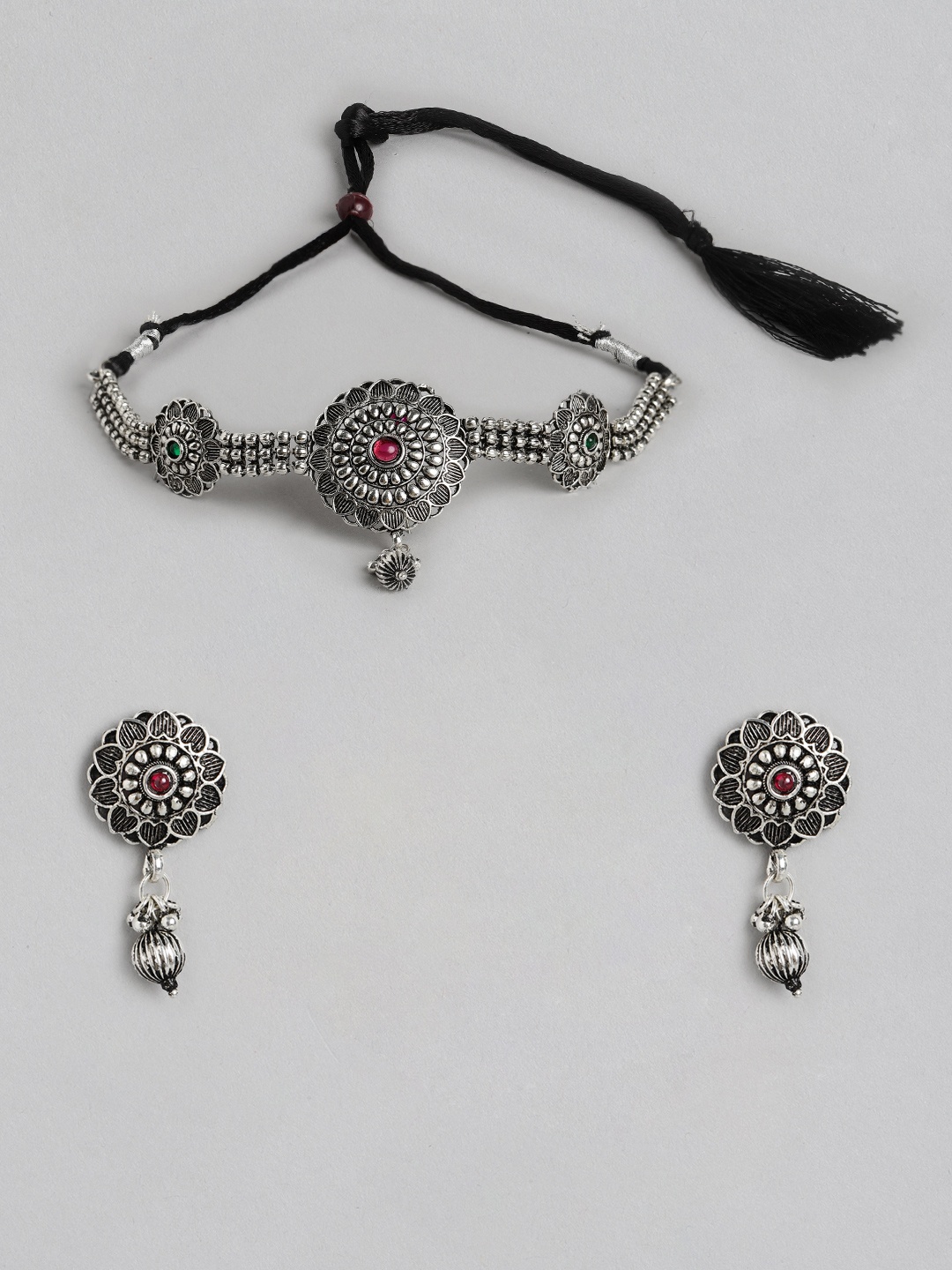 

Kord Store Silver-Toned & Red Oxidised Studded Jewellery Set