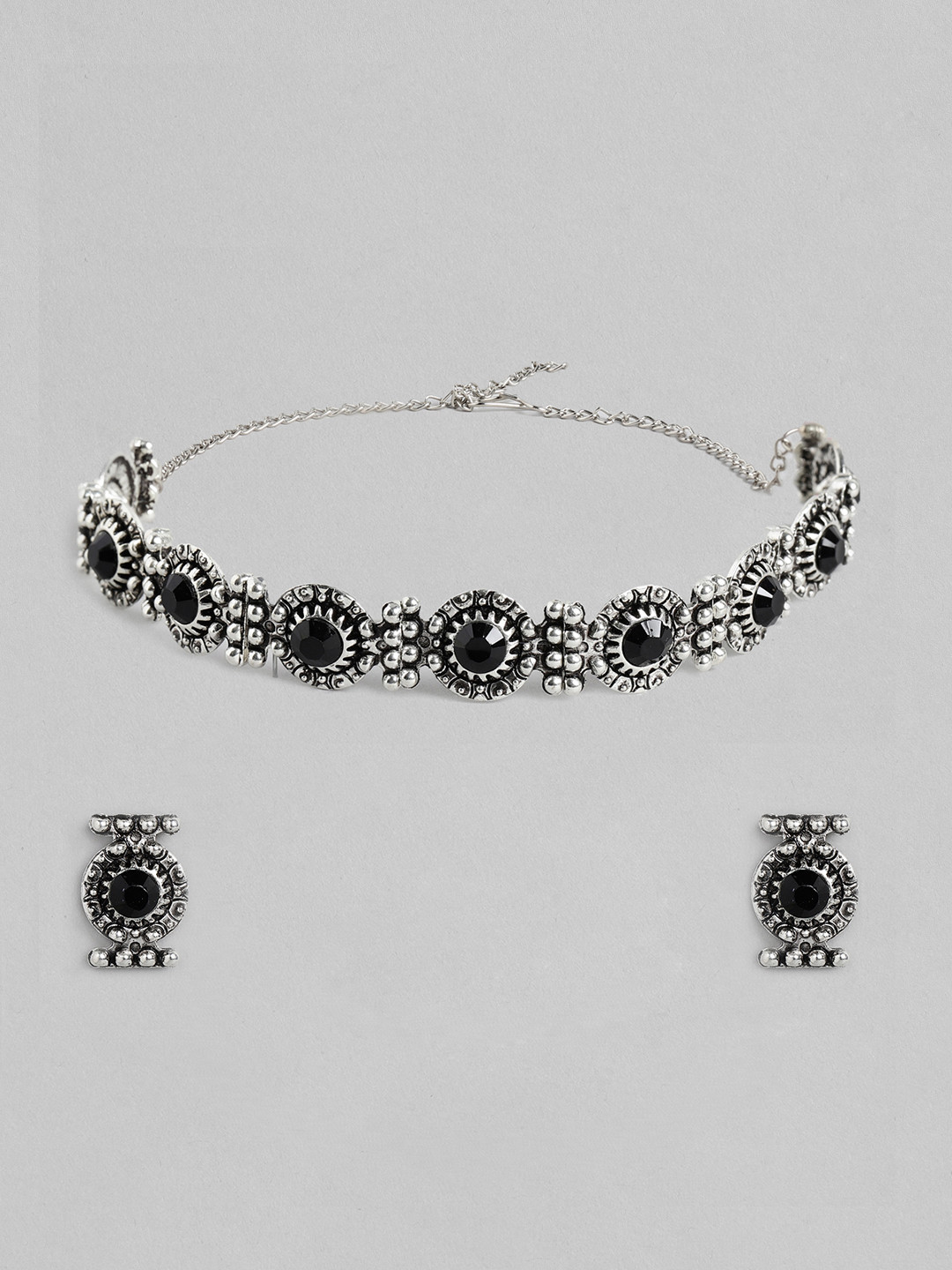 

Kord Store Silver-Toned & Black Oxidised Studded Jewellery Set