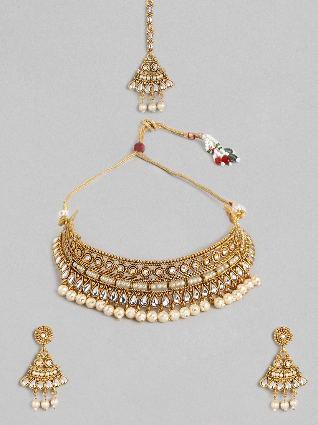 

Kord Store Women Gold-Plated & Off White Kundan Choker Necklace Set