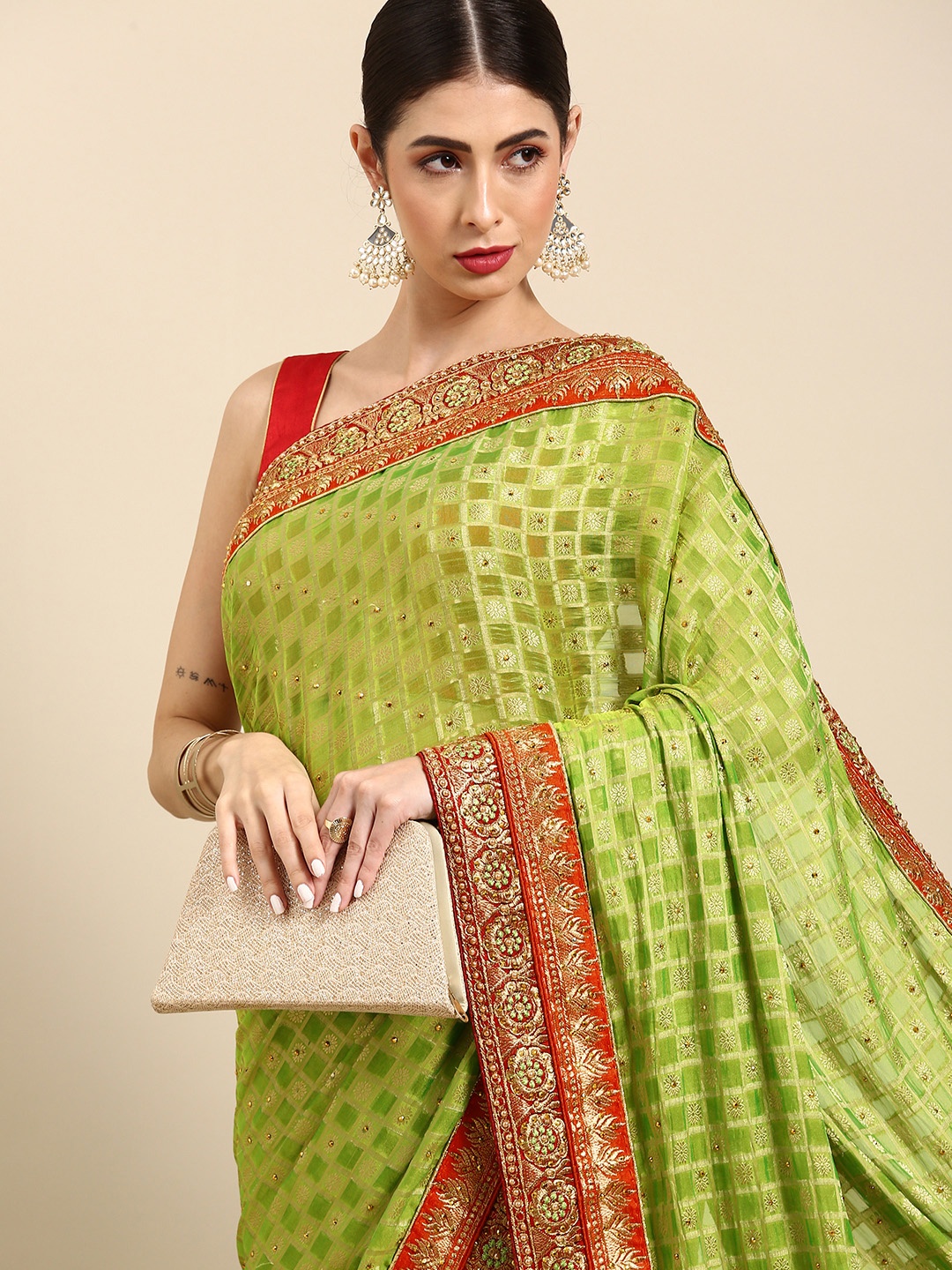 

Anouk Green Self-Checked & Embellished Saree