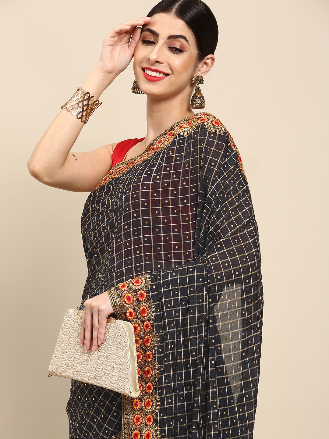 

Anouk Black & Golden Checked & Embellished Saree