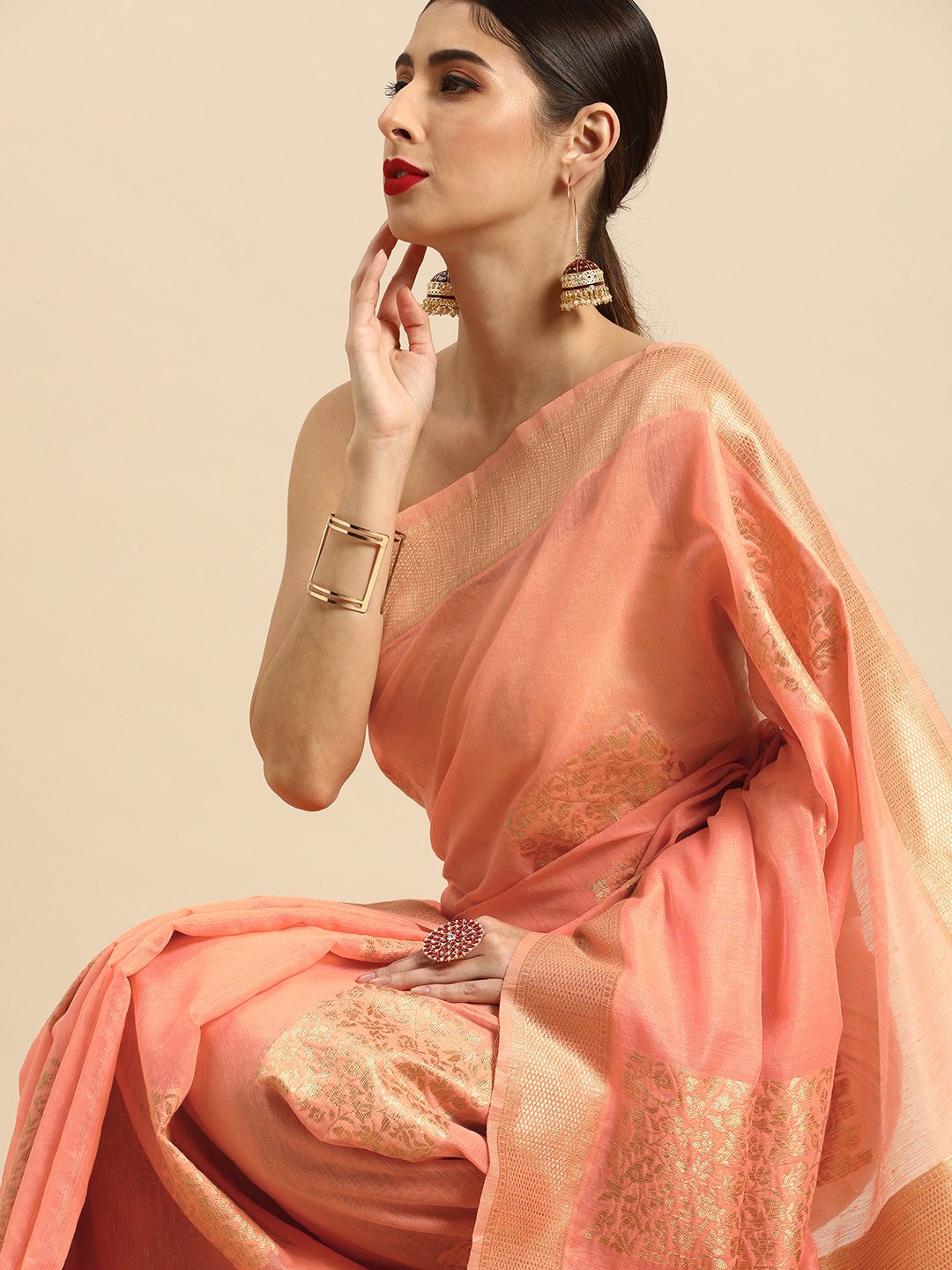 

Anouk Peach-Coloured & Golden Floral Woven Design Chanderi Saree