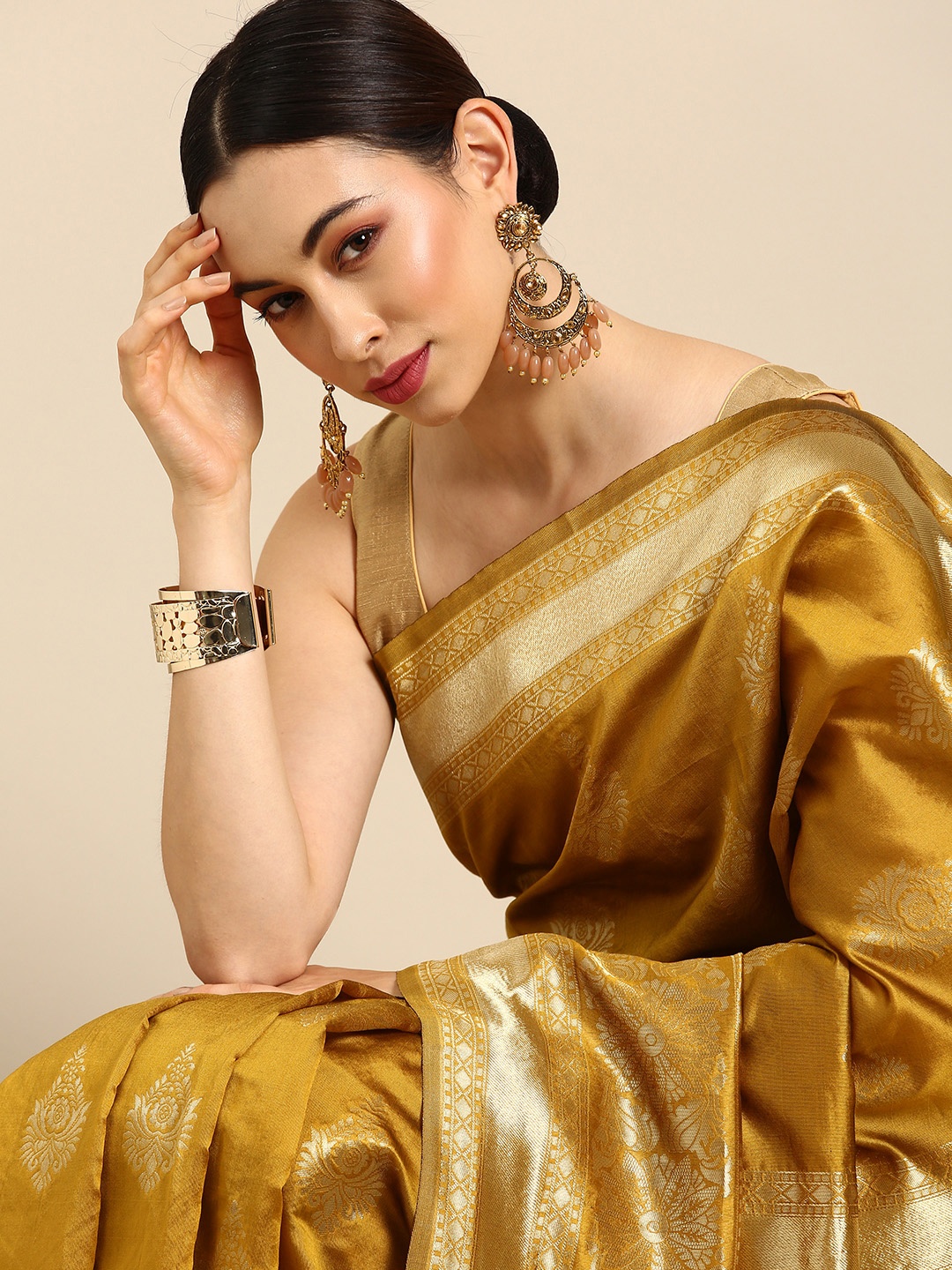 

Anouk Mustard Woven Design Zari Silk Blend Banarasi Saree