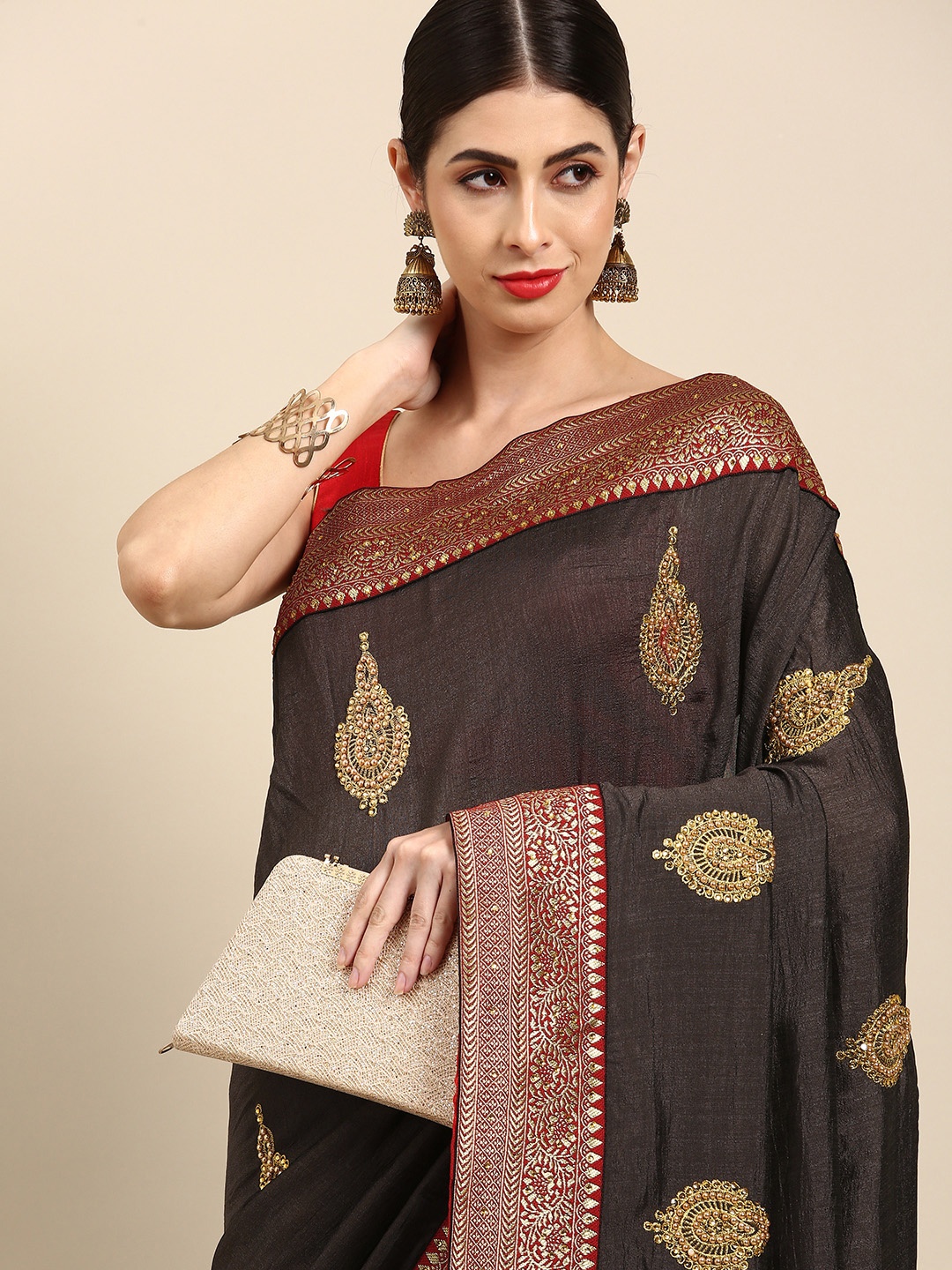 

Anouk Black & Golden Embellished Saree