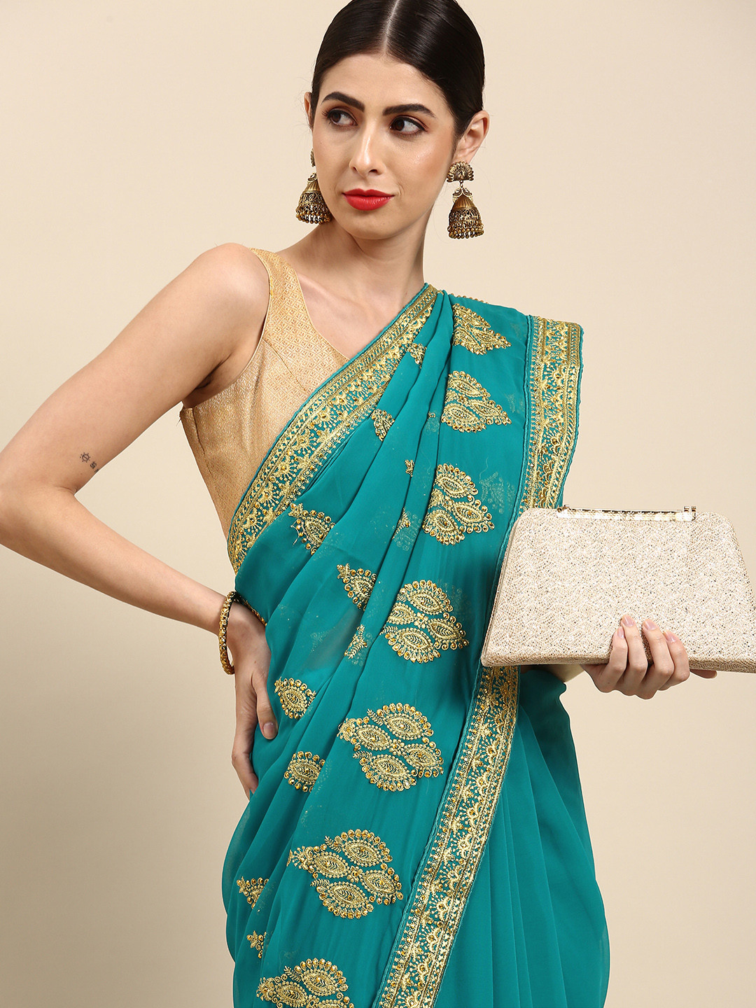 

Anouk Turquoise Blue & Golden Ethnic Motifs Embroidered Saree