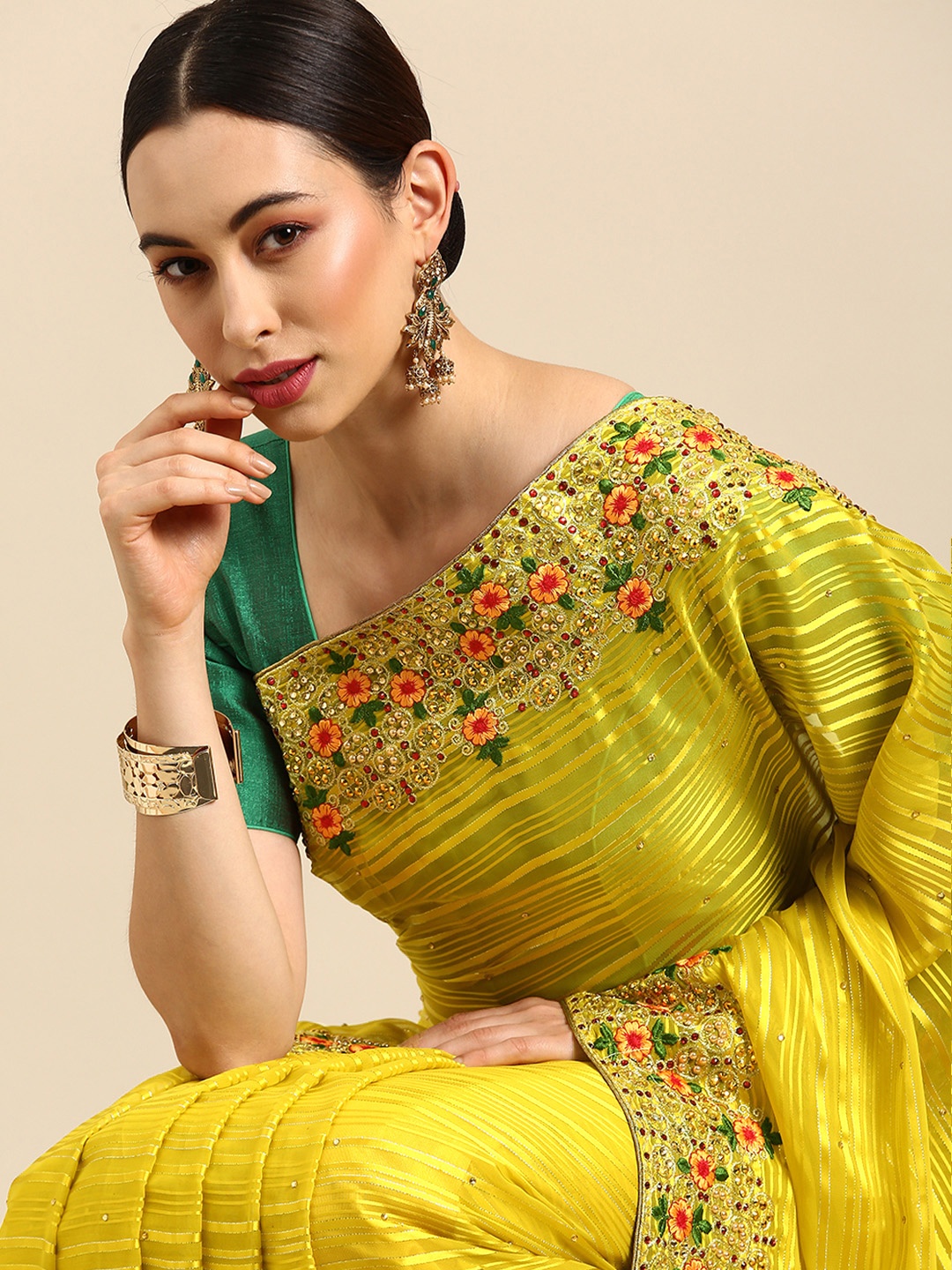 

Anouk Mustard Embellished Beads and Stones Leheriya Saree