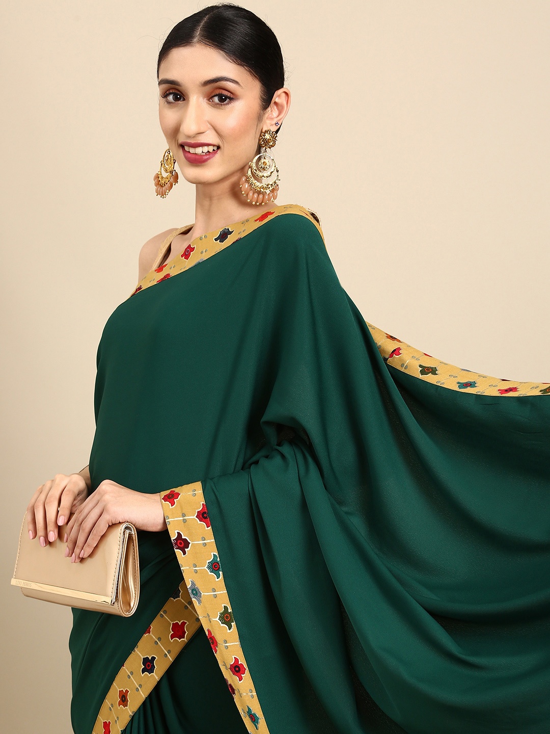 

Anouk Green & Mustard Kalamkari Bagru Saree