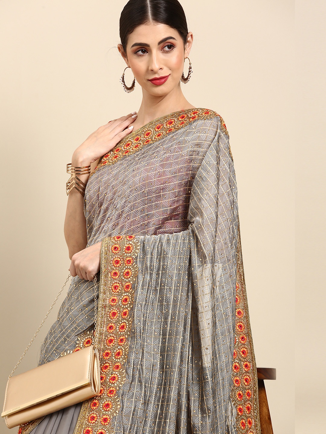 

Anouk Light Grey & Golden Self-Checked Stone-Studded Saree