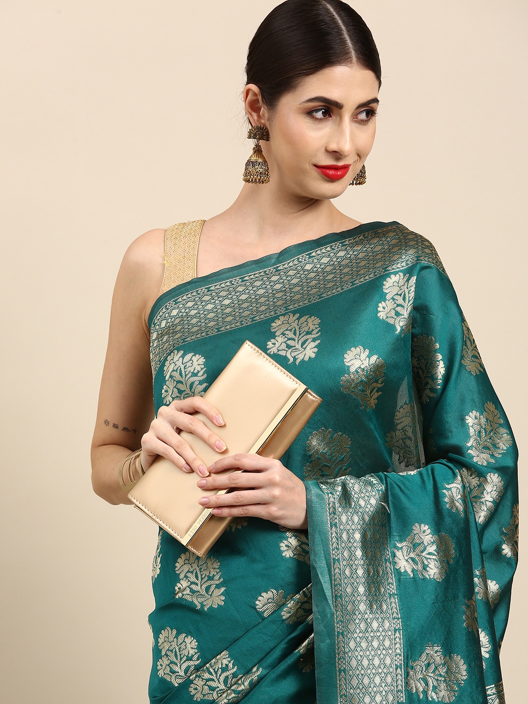 

Anouk Teal Green & Beige Ethnic Motifs Zari Silk Blend Banarasi Saree