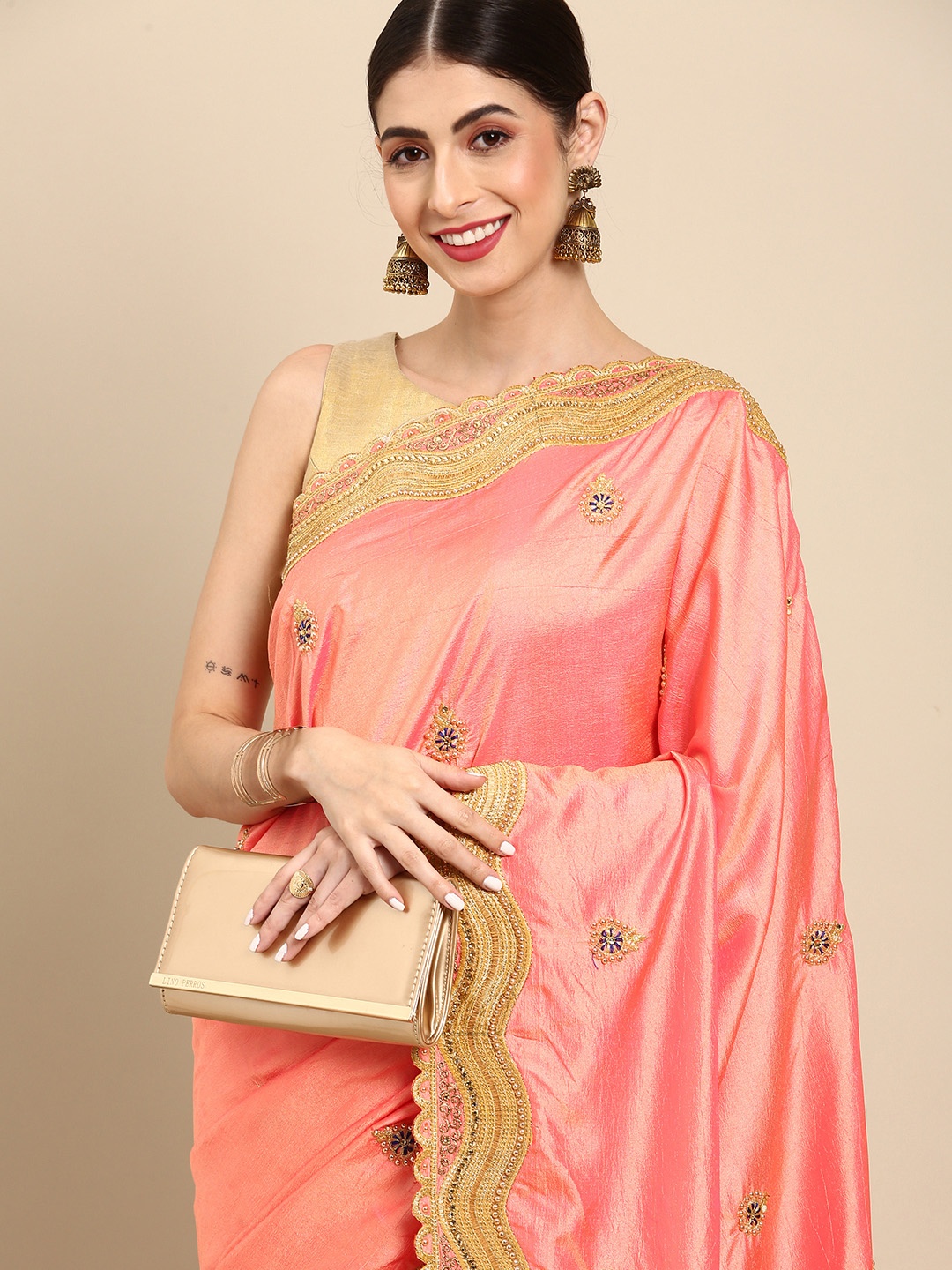 

Anouk Peach-Coloured & Golden Ethnic Motifs Embroidered Beads and Stones Art Silk Saree