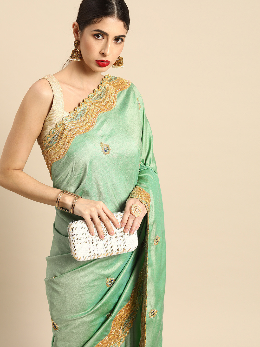 

Anouk Sea Green & Gold-Toned Ethnic Motifs Beads and Stones Art Silk Narayan Peth Saree