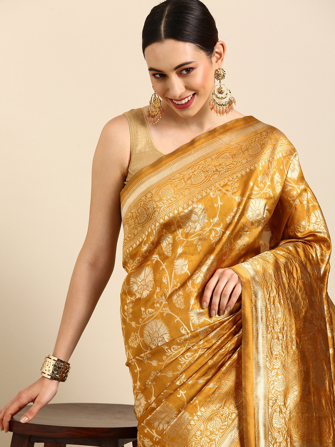 

Anouk Mustard Woven Design Zari Silk Blend Banarasi Saree