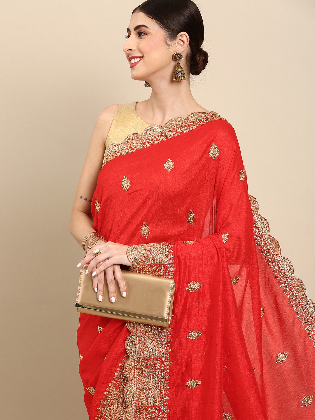 

Anouk Red & Golden Ethnic Motifs Embroidered Beads and Stones Pure Silk Saree