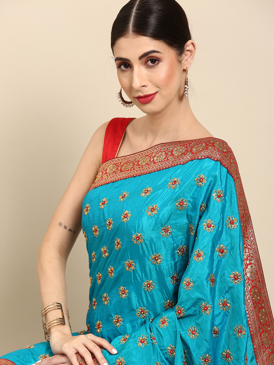 

Anouk Blue & Golden Floral Embroidered Pure Silk Saree
