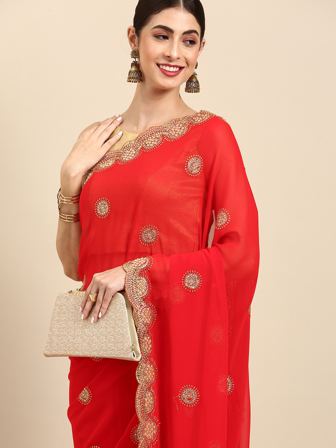 

Anouk Red & Golden Ethnic Motifs Embroidered Saree