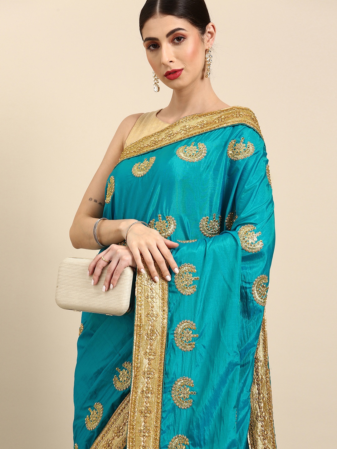 

Anouk Turquoise Blue & Gold-Toned Embellished Pure Silk Saree