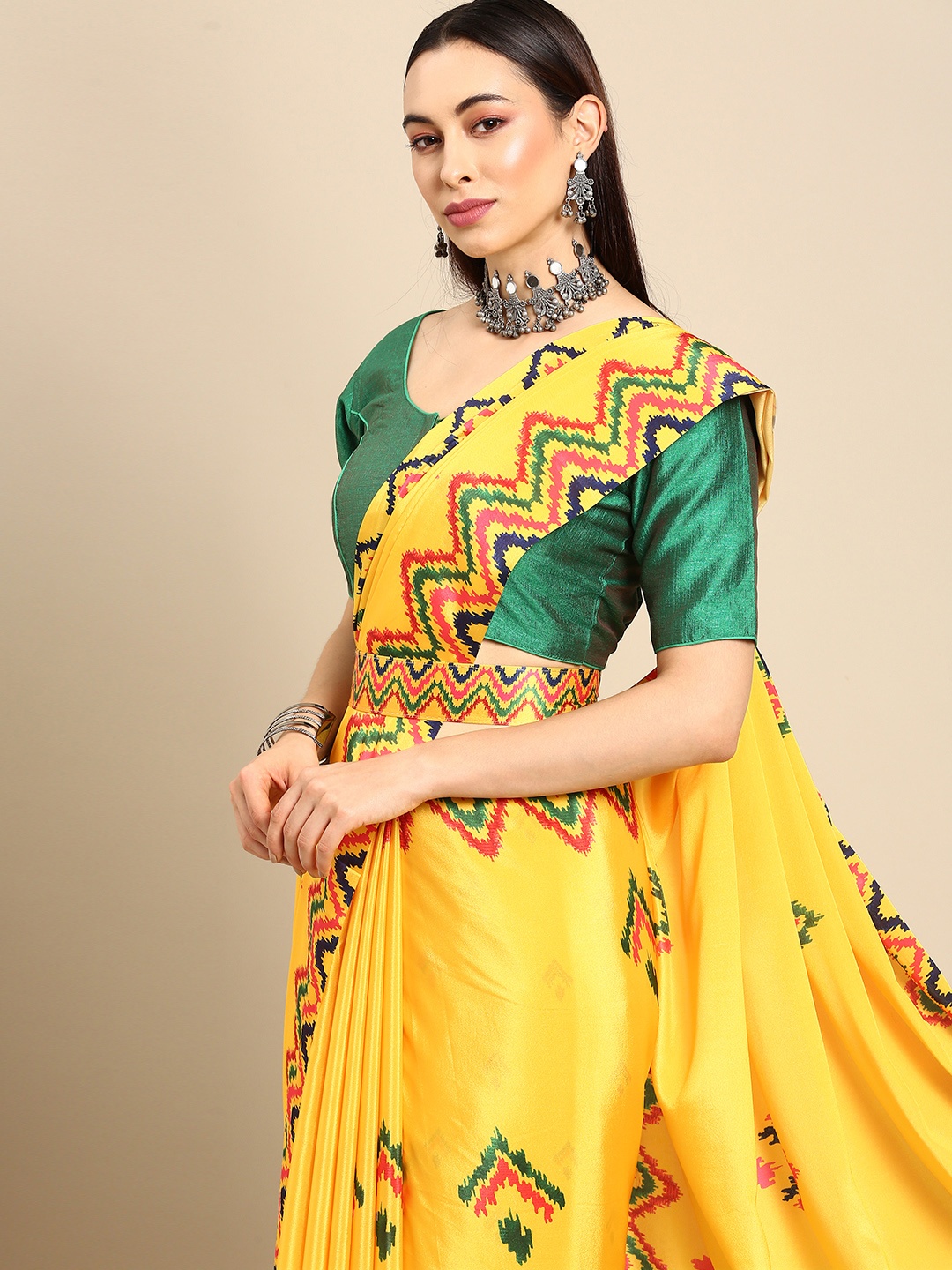 

Anouk Yellow & Orange Jaali Ready to Wear Ikat Saree